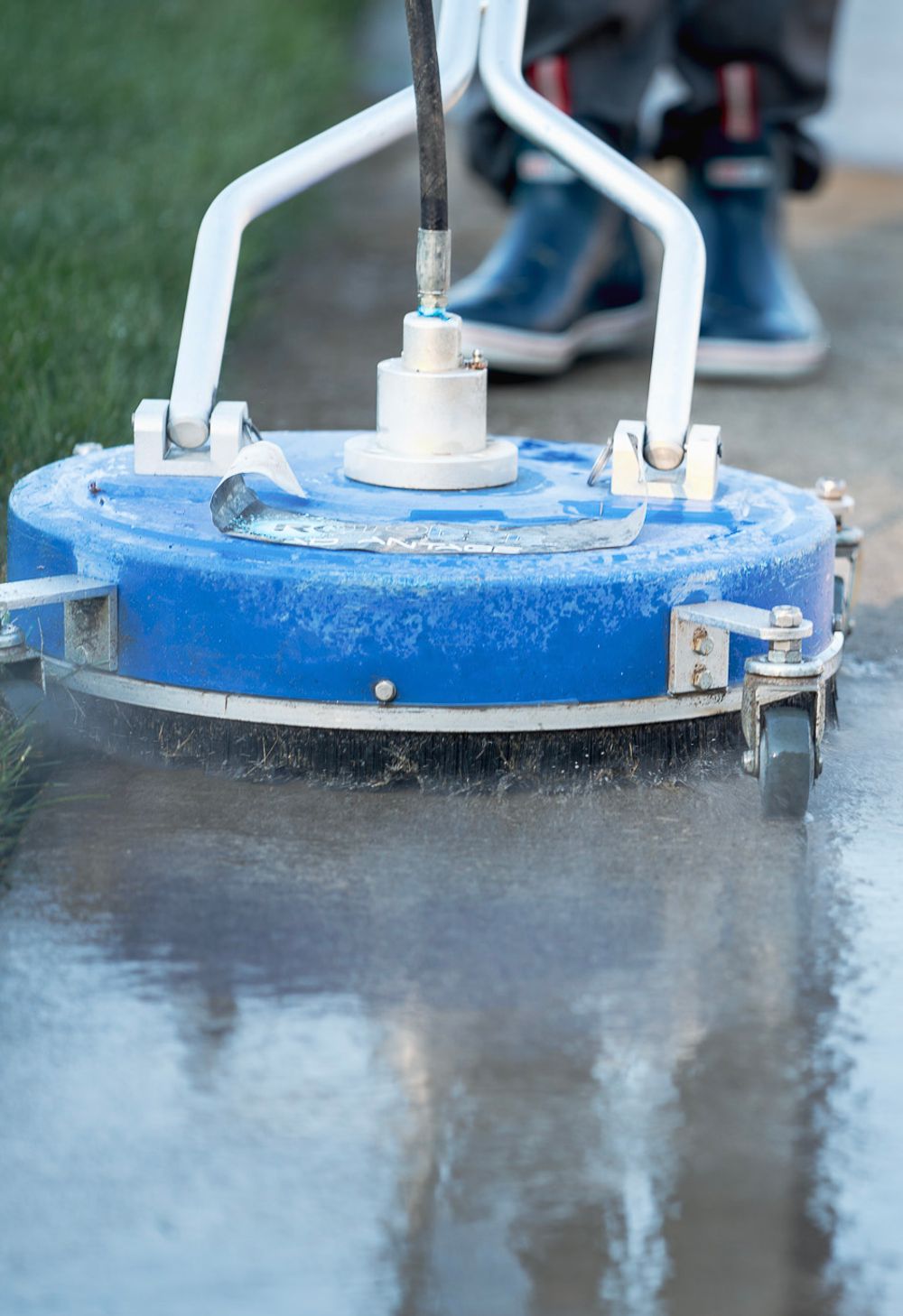 surface cleaner on a concrete driveway