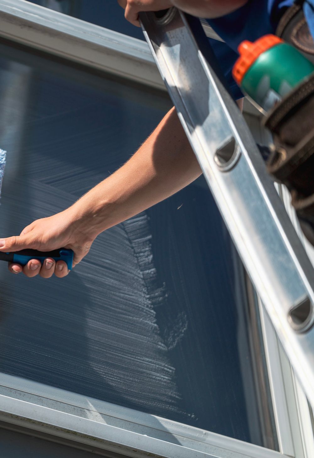 cleaning exterior windows of a Grand Rapids home